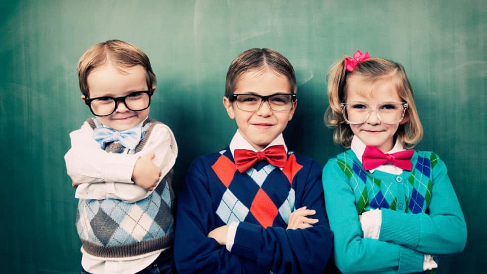 three kids wearing glasses