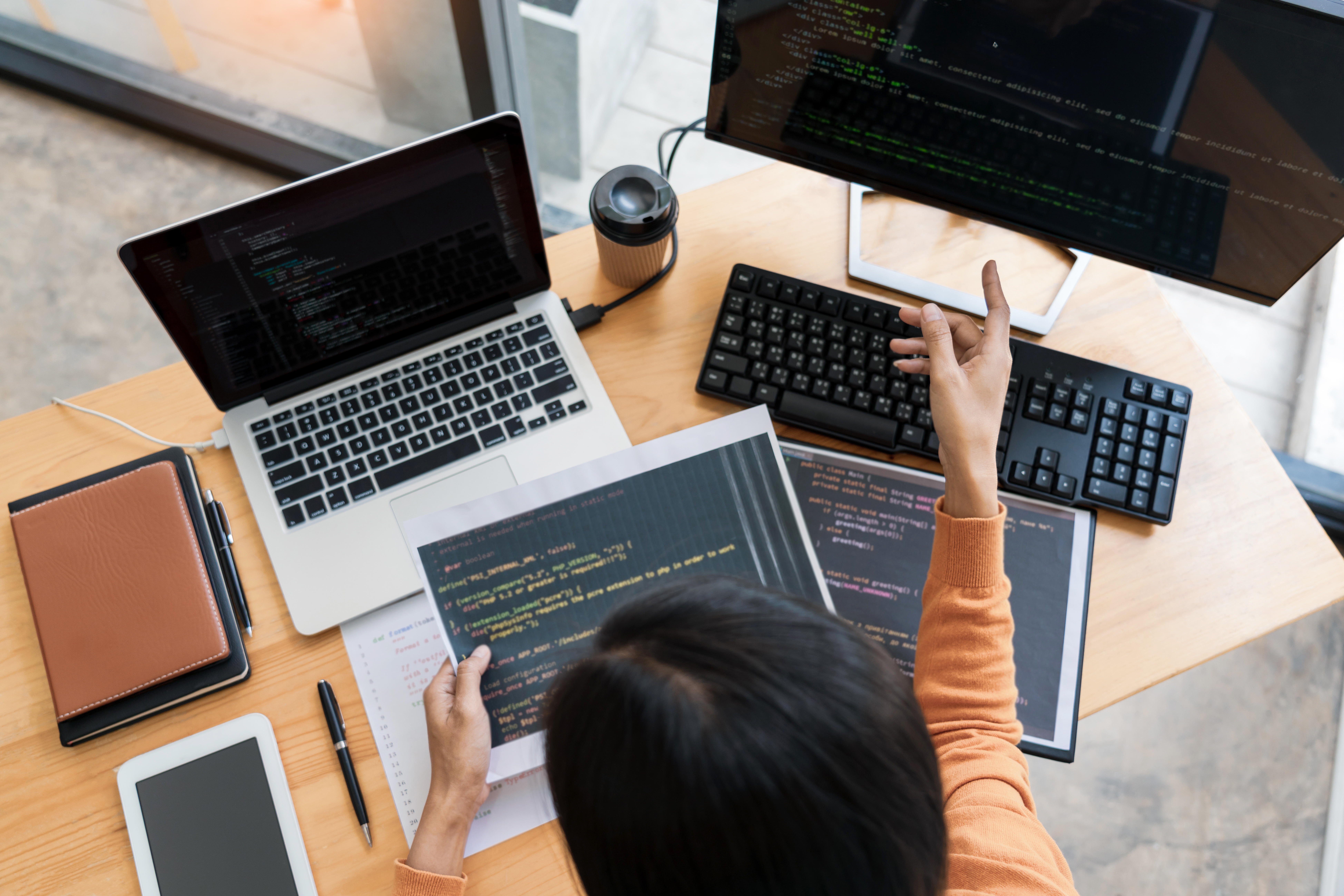 Asian team Outsource Developer Looking Screen Programming Code - Juvo